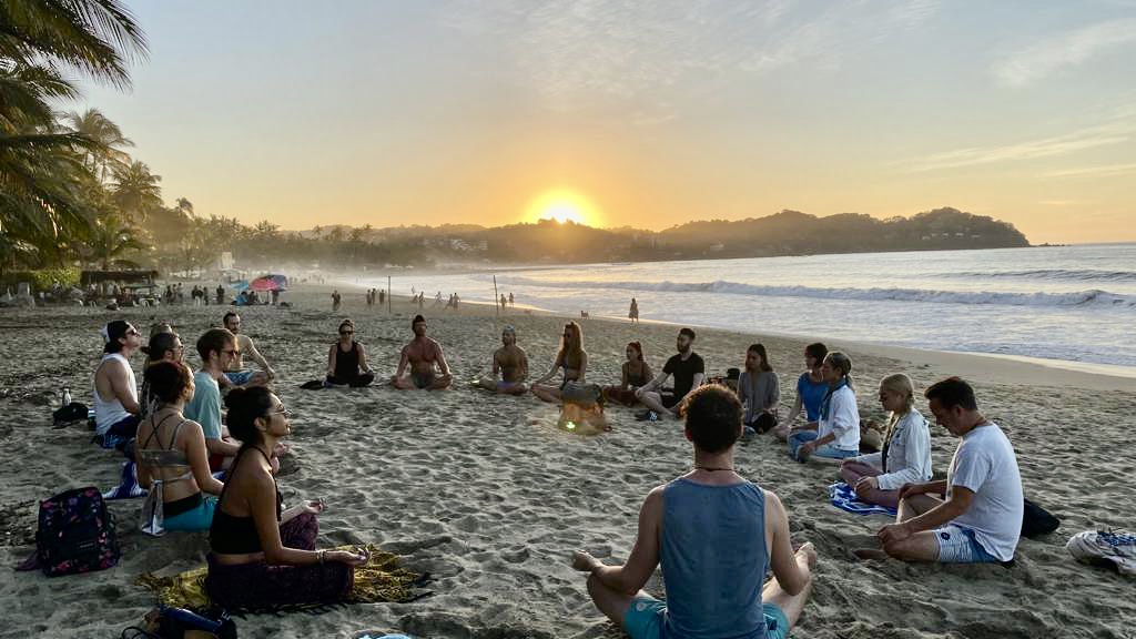 connected breathing session on beach in Mexico