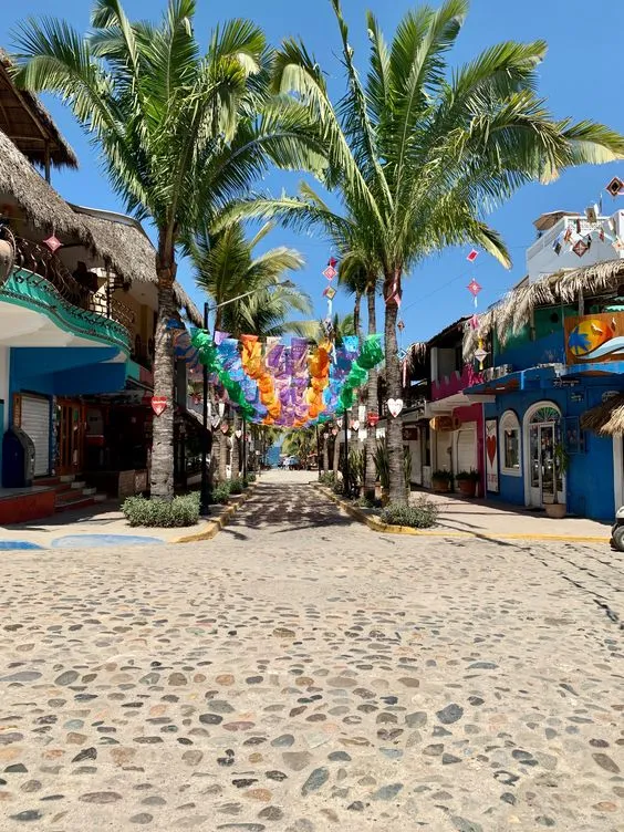 top-things-to-do-sayulita-selfie-street – Unity Breathwork flag street, sayulita, mexico